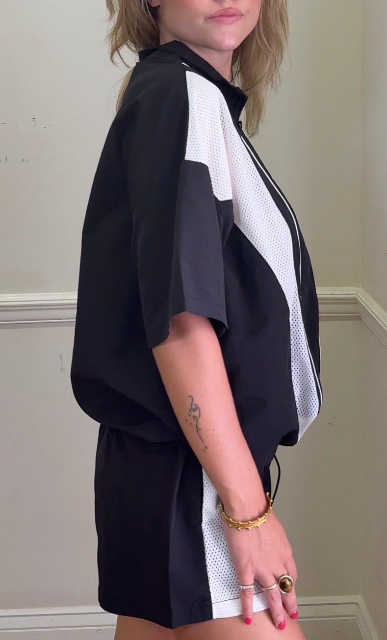 Nylon & mesh contrast half zip-up short slv top