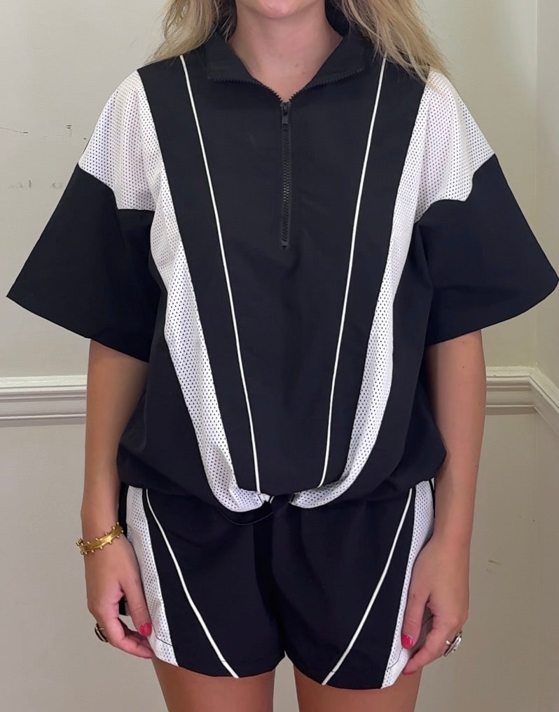 Nylon & mesh contrast half zip-up short slv top