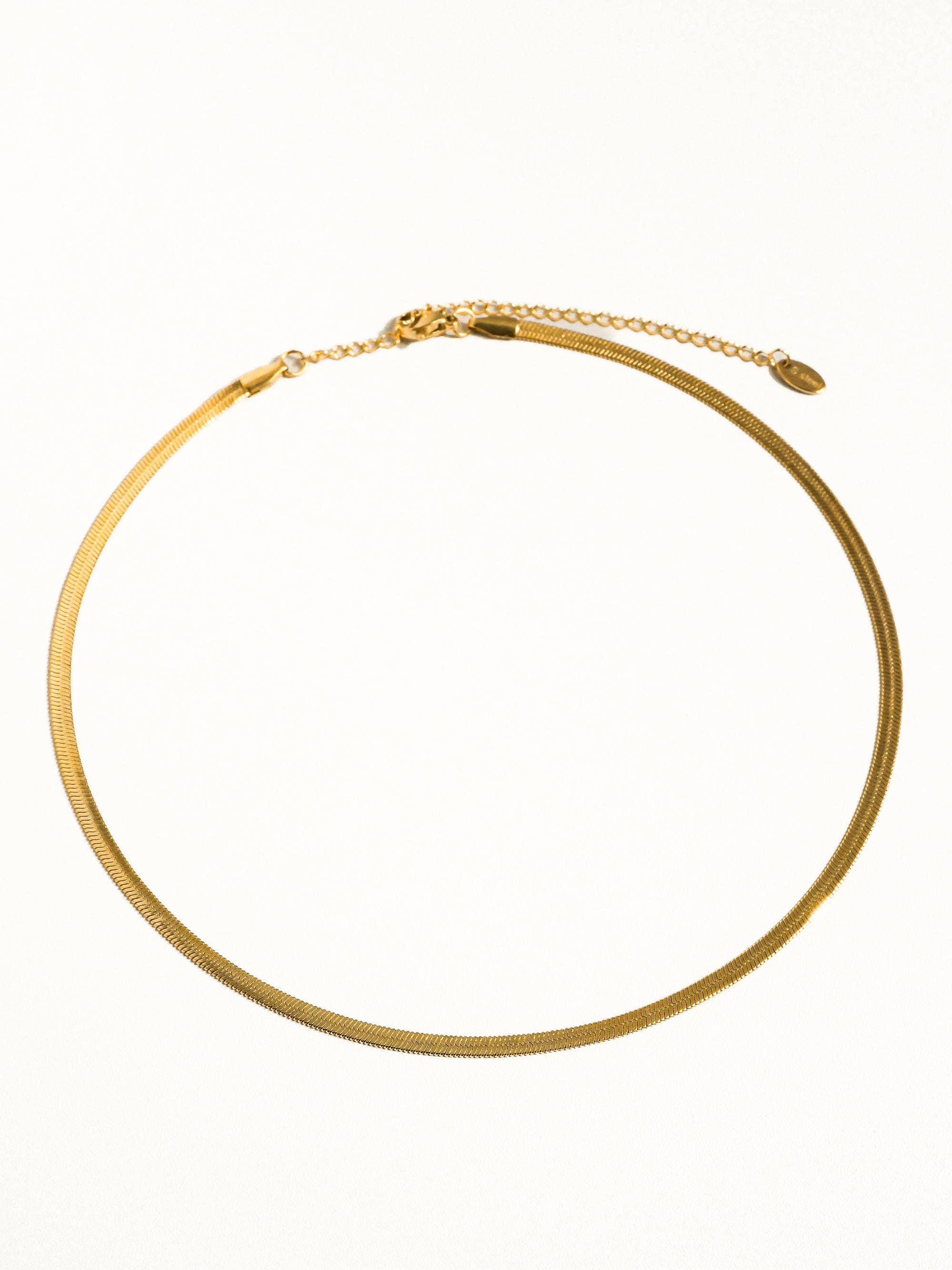 Collectique 18K Gold Non-Tarnish Flat Snake Chain Necklace & Bracelet Bracelets Flânerie by MAIQ Yellow Gold / Sylvie Necklace Collectique Yellow Gold / Sylvie Necklace Flânerie by MAIQ Bracelets 18K Gold Non-Tarnish Flat Snake Chain Necklace & Bracelet