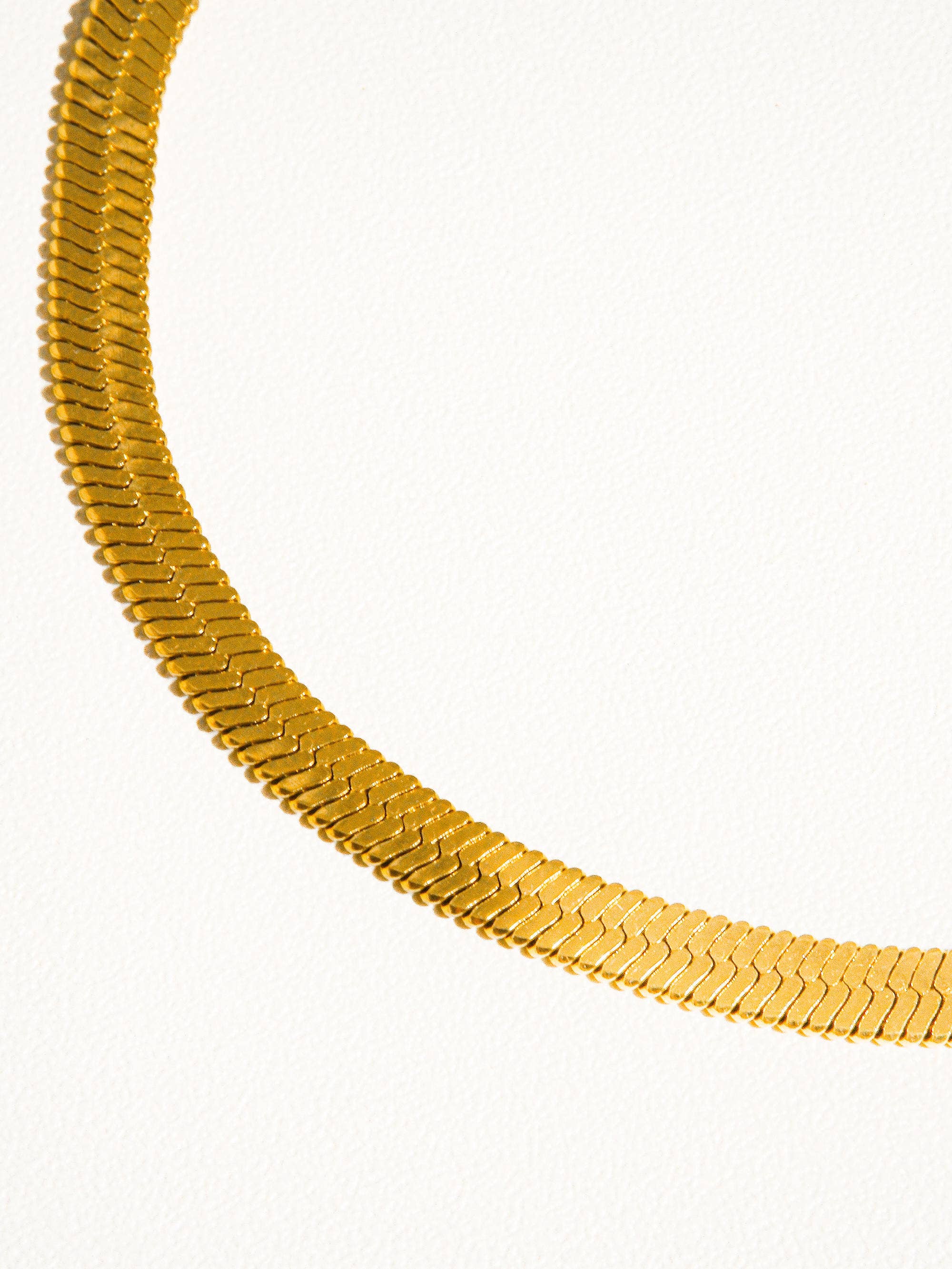 Collectique 18K Gold Non-Tarnish Flat Snake Chain Necklace & Bracelet Bracelets Flânerie by MAIQ Yellow Gold / Sylvie Necklace Collectique Yellow Gold / Sylvie Necklace Flânerie by MAIQ Bracelets 18K Gold Non-Tarnish Flat Snake Chain Necklace & Bracelet